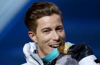 USA's Shaun White with his gold medal after victory in the Men's Halfpipe Snowboard during the medal ceremony at the Medal Plaza during day five of the PyeongChang 2018 Winter Olympic Games in South Korea. (Photo by Mike Egerton/PA Images via Getty Images)