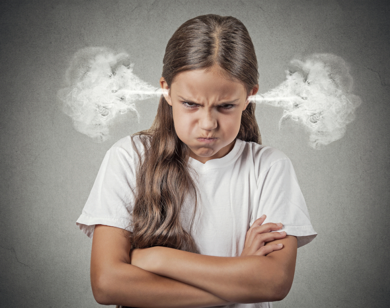 Closeup portrait Angry young girl Blowing Steam coming out of ears about to have Nervous atomic breakdown isolated grey background. Negative human emotions Facial Expression feeling attitude reaction