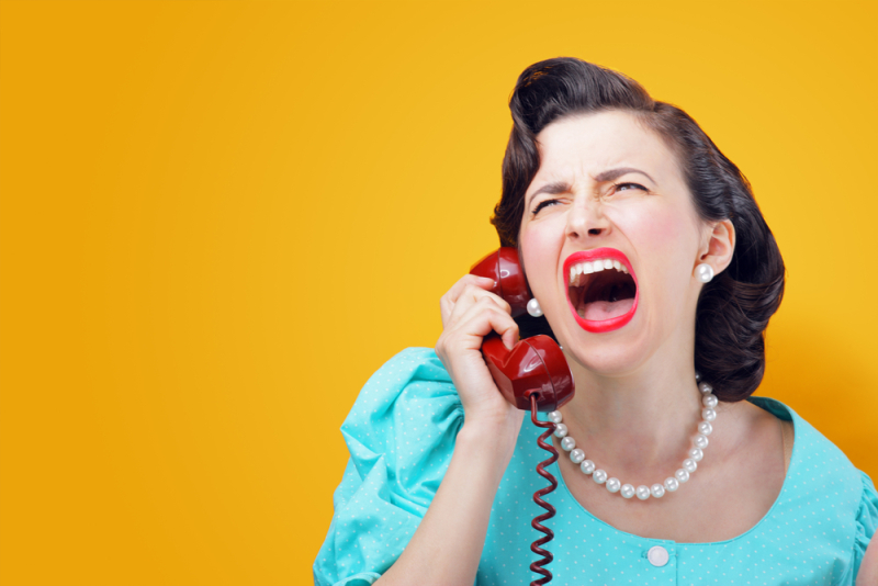 Vintage Woman shouting into telephone