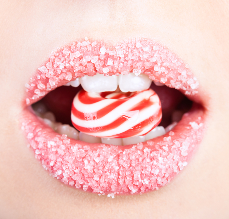 A lollipop in the mouth (close-up)