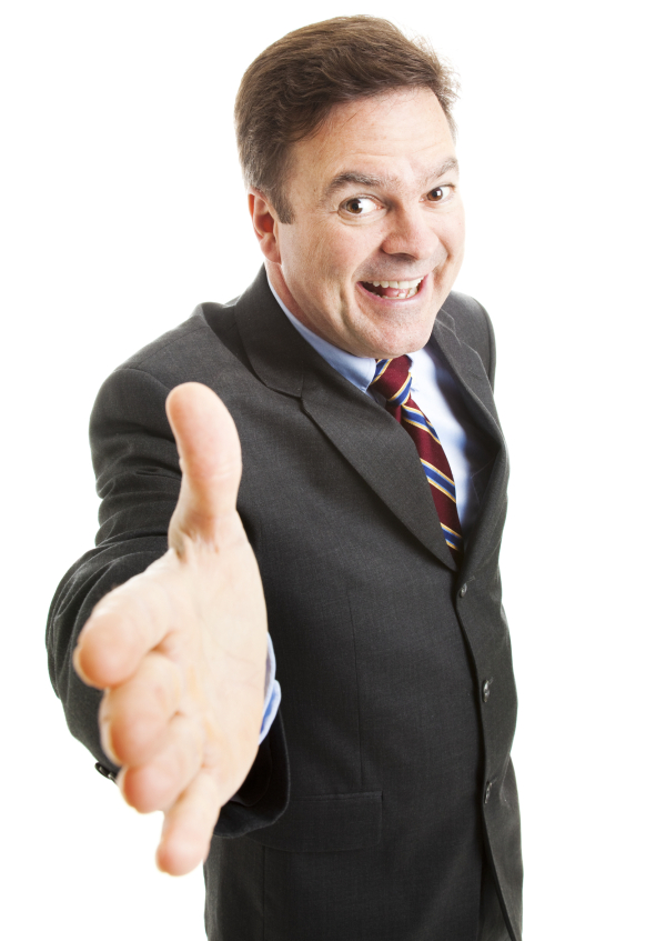 Pushy salesman with an oversized grin, coming in for a handshake. Isolated on white. 