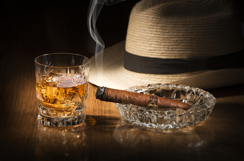 Cuban style rum and cigar close up