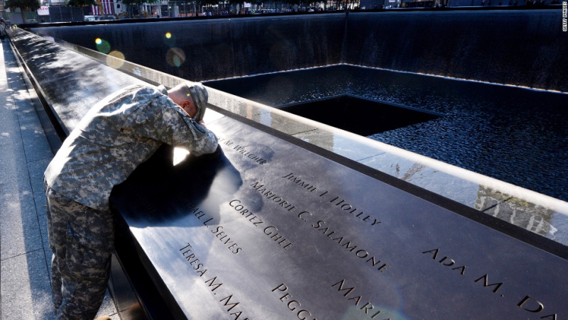 Scott Willens, who joined the United States Army three days after the terrorist attacks on 9/11, pauses while reflecting by the South Pool on friends he has lost while on deployment during anniversary ceremonies at the site of the World Trade Center on 11 September 2012 in New York, New York, USA. POOL/Justin Lane/EPA