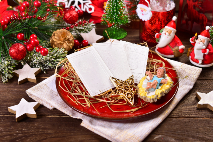 traditional christmas eve wafers on plate with hay